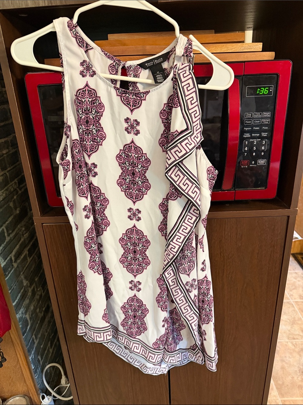 White House Black Market sleeveless asymmetrical blouse in white and maroon